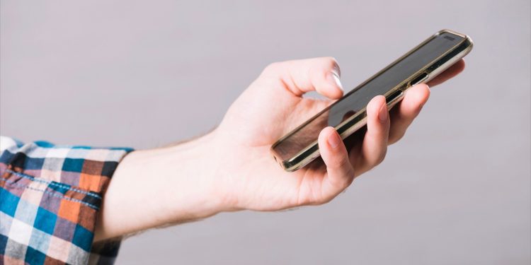 Телефон в руке